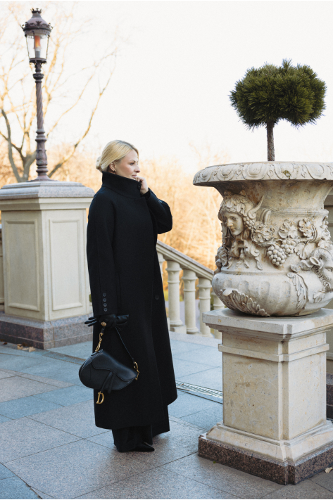 Coat with a high collar, black